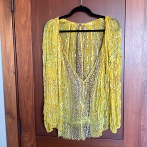 Free People size M sheer yellow blouse.